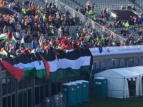 العلم الفلسطيني عنوان أبناء فلسطين في ماراثون امستردام