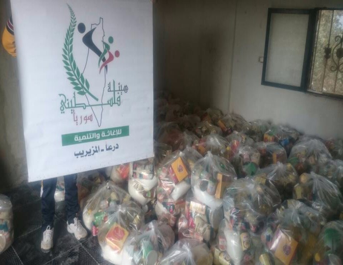 هيئة فلسطينيي سورية توزع مساعدات غذائية في درعا