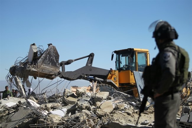 Israeli forces demolish Palestinian shop in East Jerusalem neighborhood
