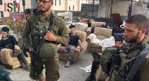 Israel soldiers force Palestinian family to halt authorised construction