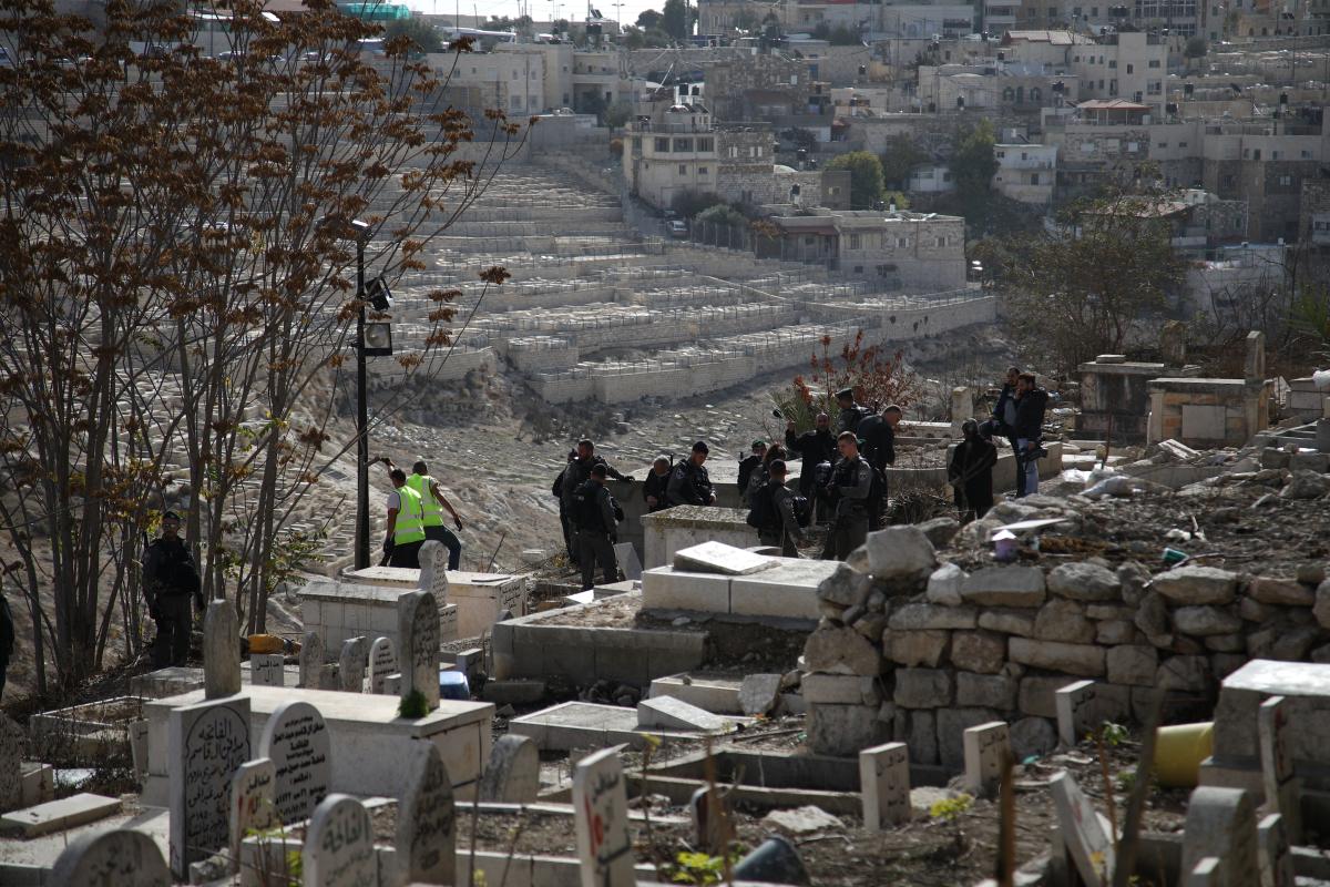 Israel forces dig up Palestinian graves in Jerusalem