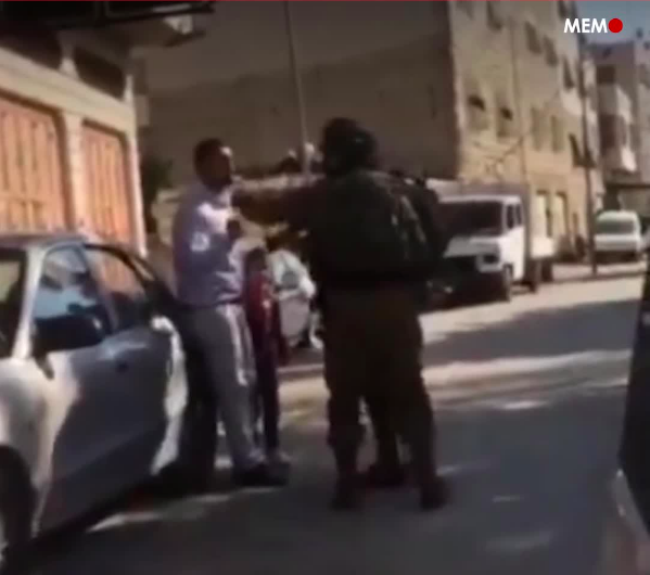 Israeli occupation soldiers filmed assaulting father in front of his young child