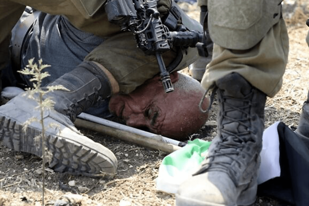 Israel soldier filmed kneeling on eldelry Palestinian’s neck in West Bank protest