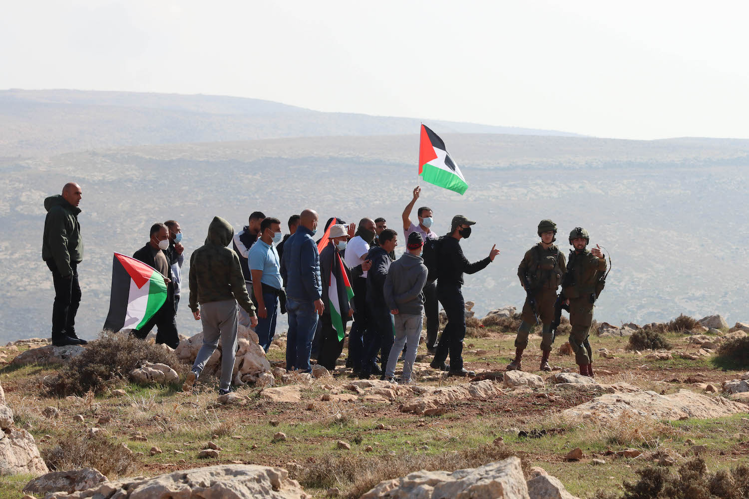 Settler opens fire at protest against West Bank outpost