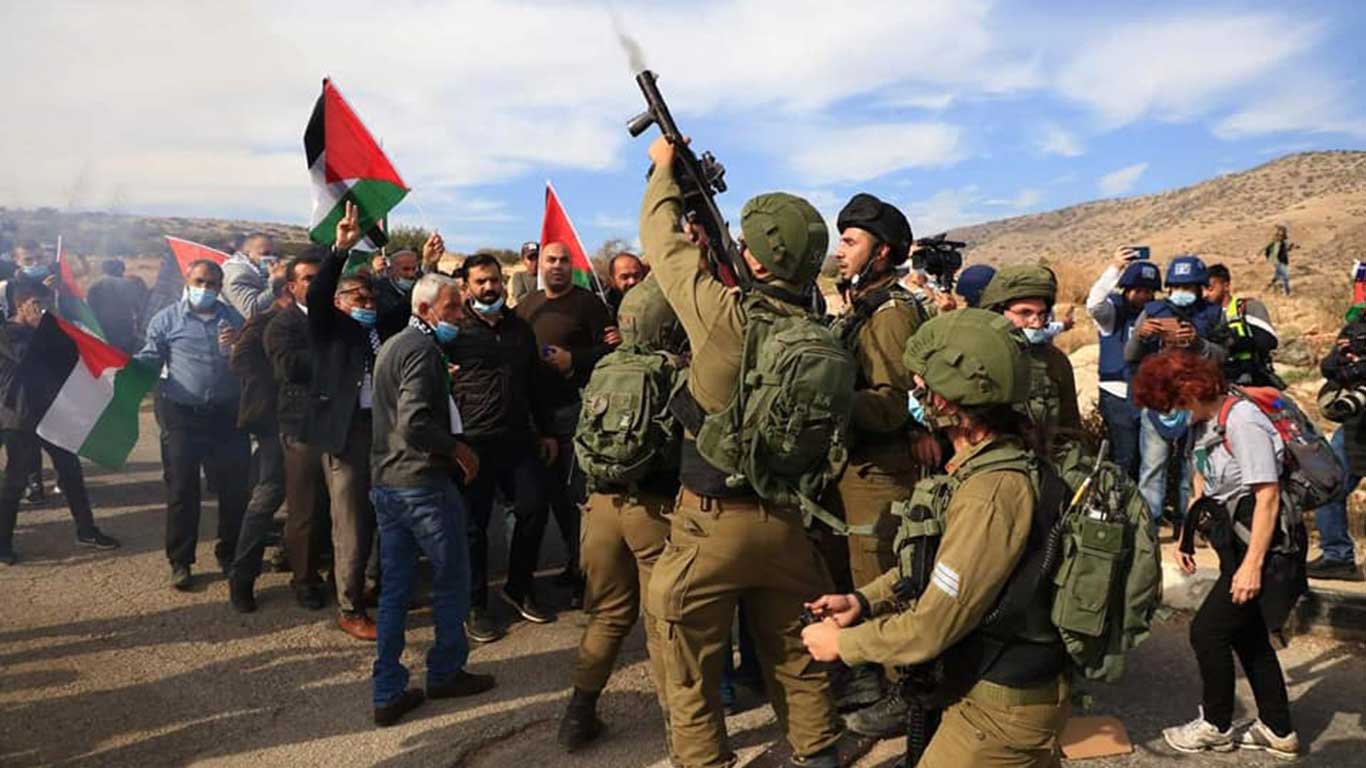 Soldiers try to force injured Palestinian out of ambulance during Jordan Valley protest