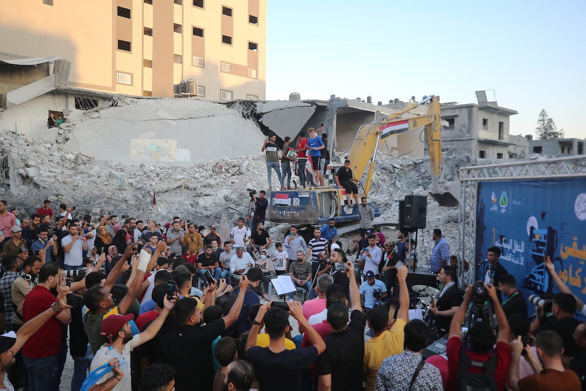 Palestinians rally for Gaza rebuilding, ending "Israel" siege